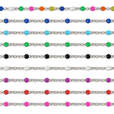 Sterling silver colorful beaded enamel chains on a white background