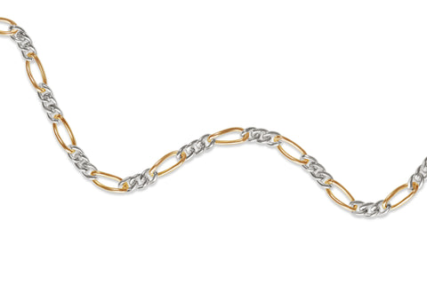 Two-tone gold filled and silver chain on a white background