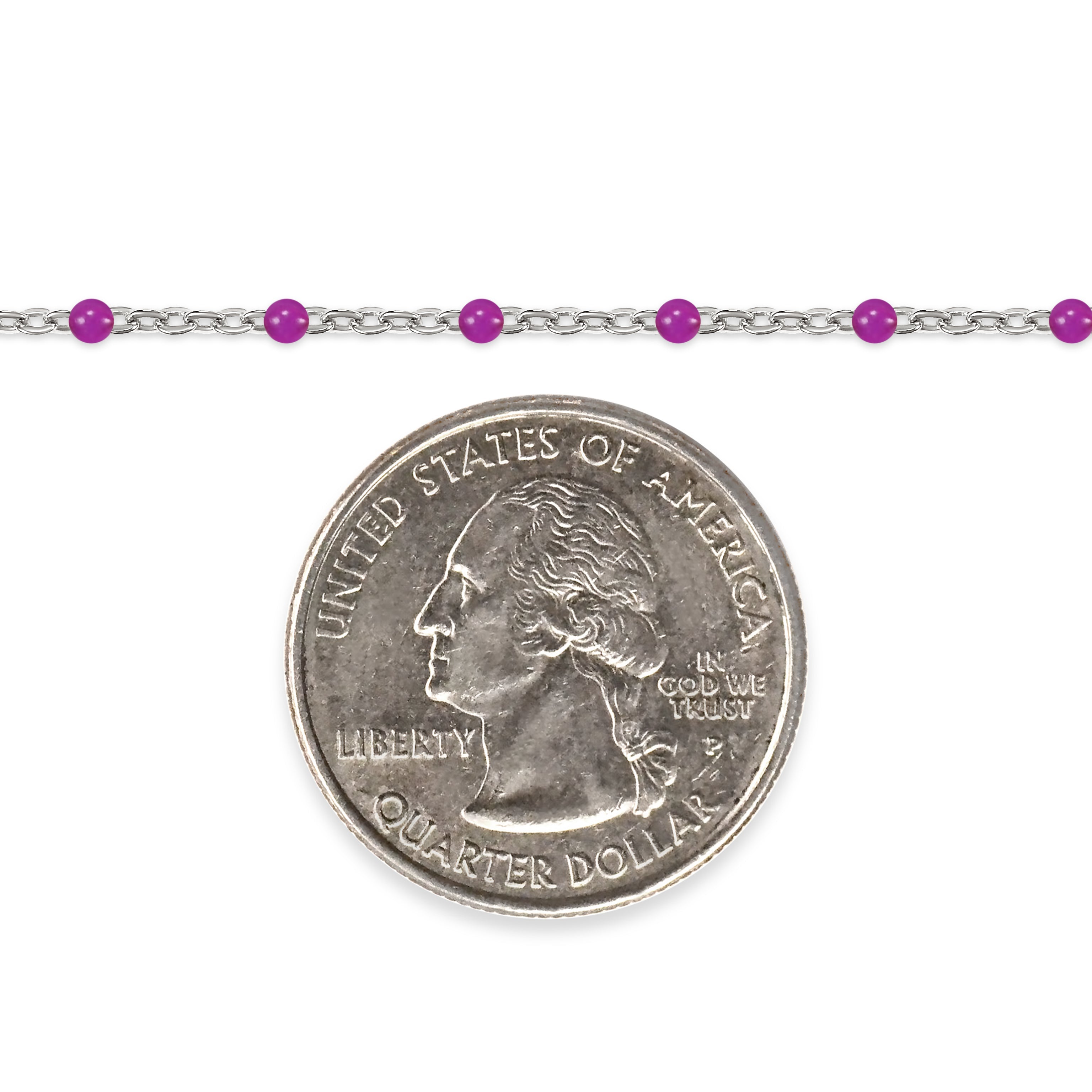 Silver chain with purple enamel beads and a quarter on a white background