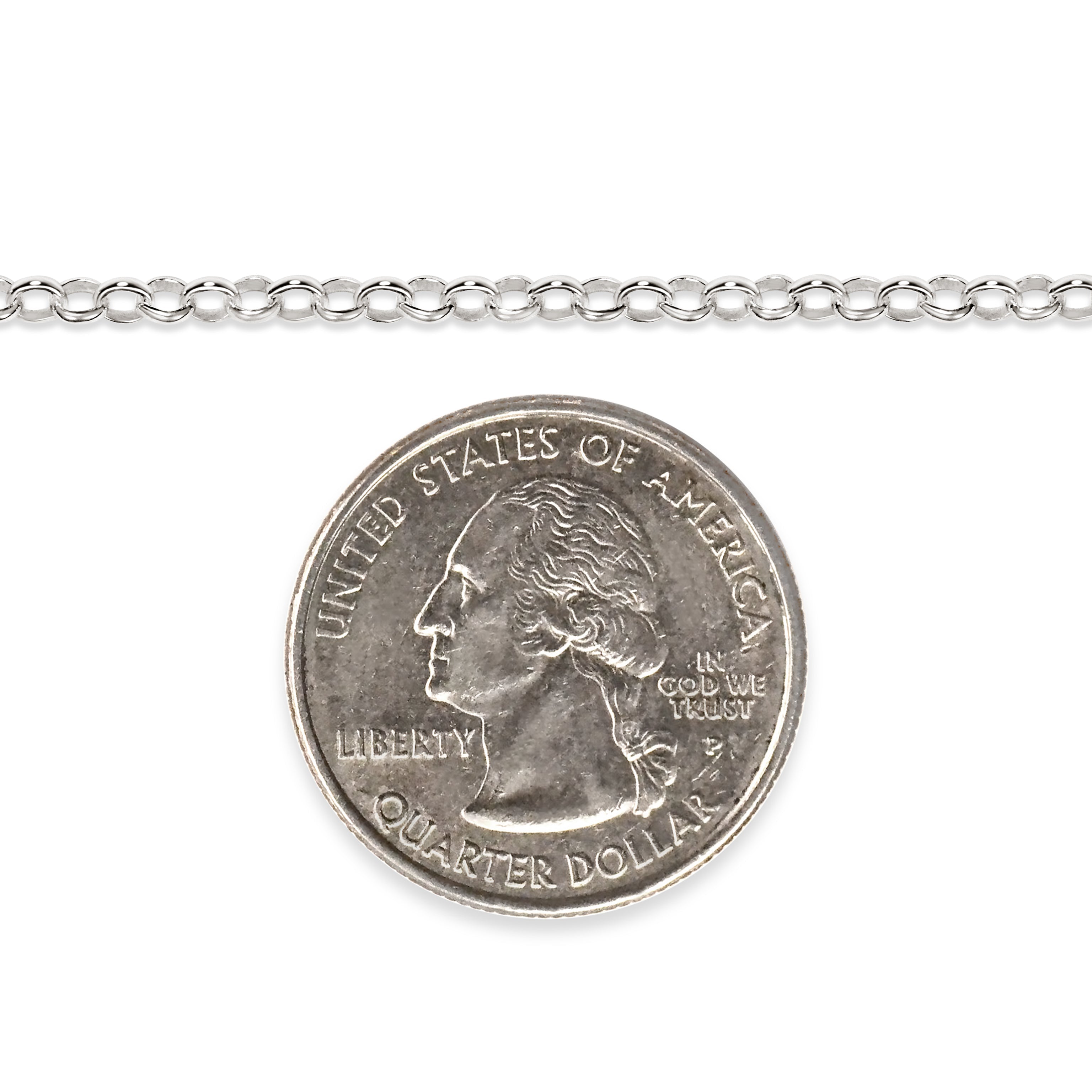 Silver chain next to a quarter dollar coin on a white background