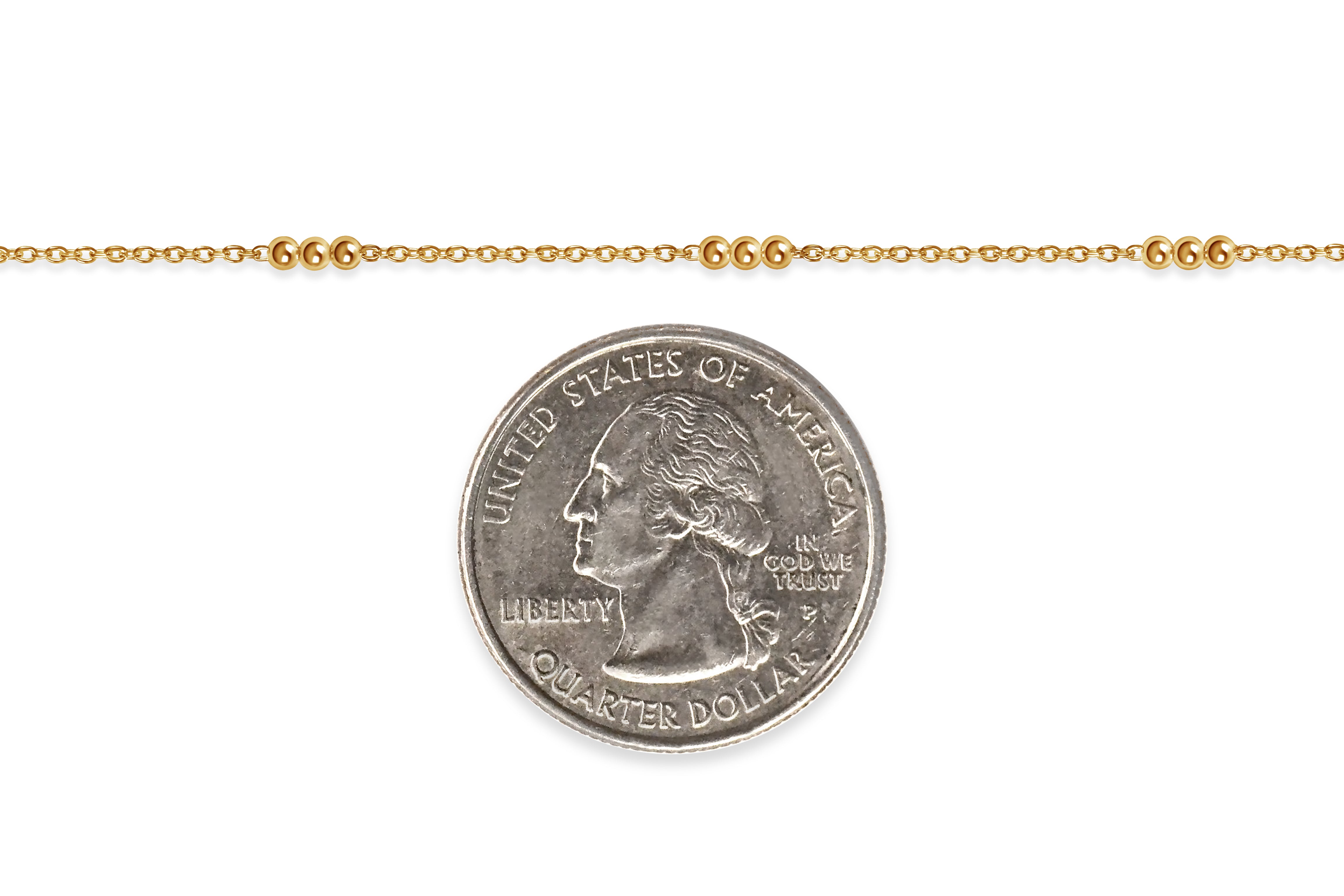 Gold-filled chain with a quarter dollar coin on a white background