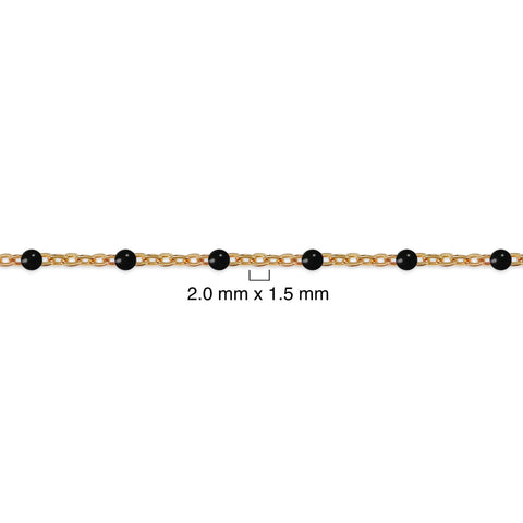 Gold chain with black beads on a white background