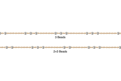 Two-tone chains with different bead counts on a white background