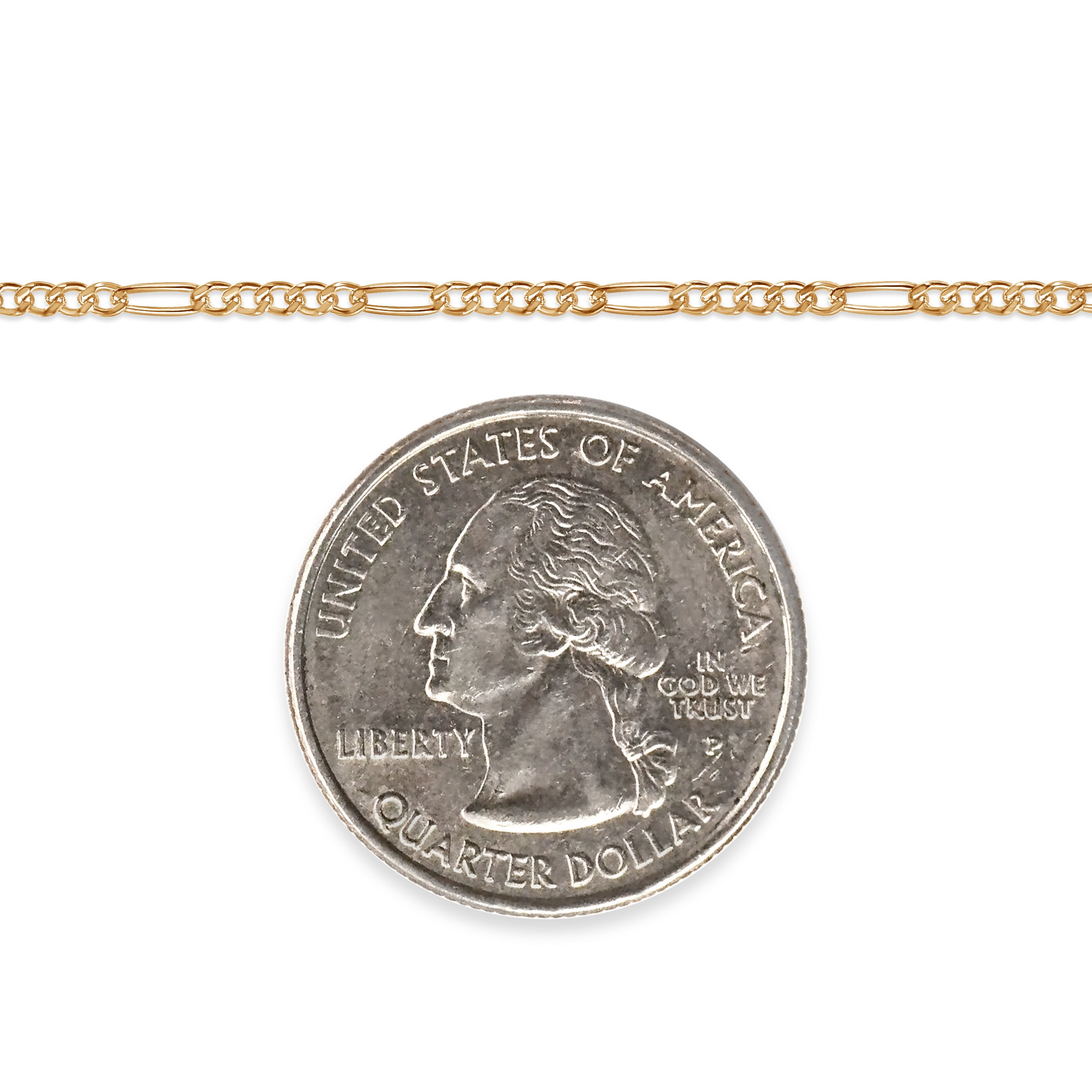 Gold-filled figaro chain next to a quarter dollar coin on a white background