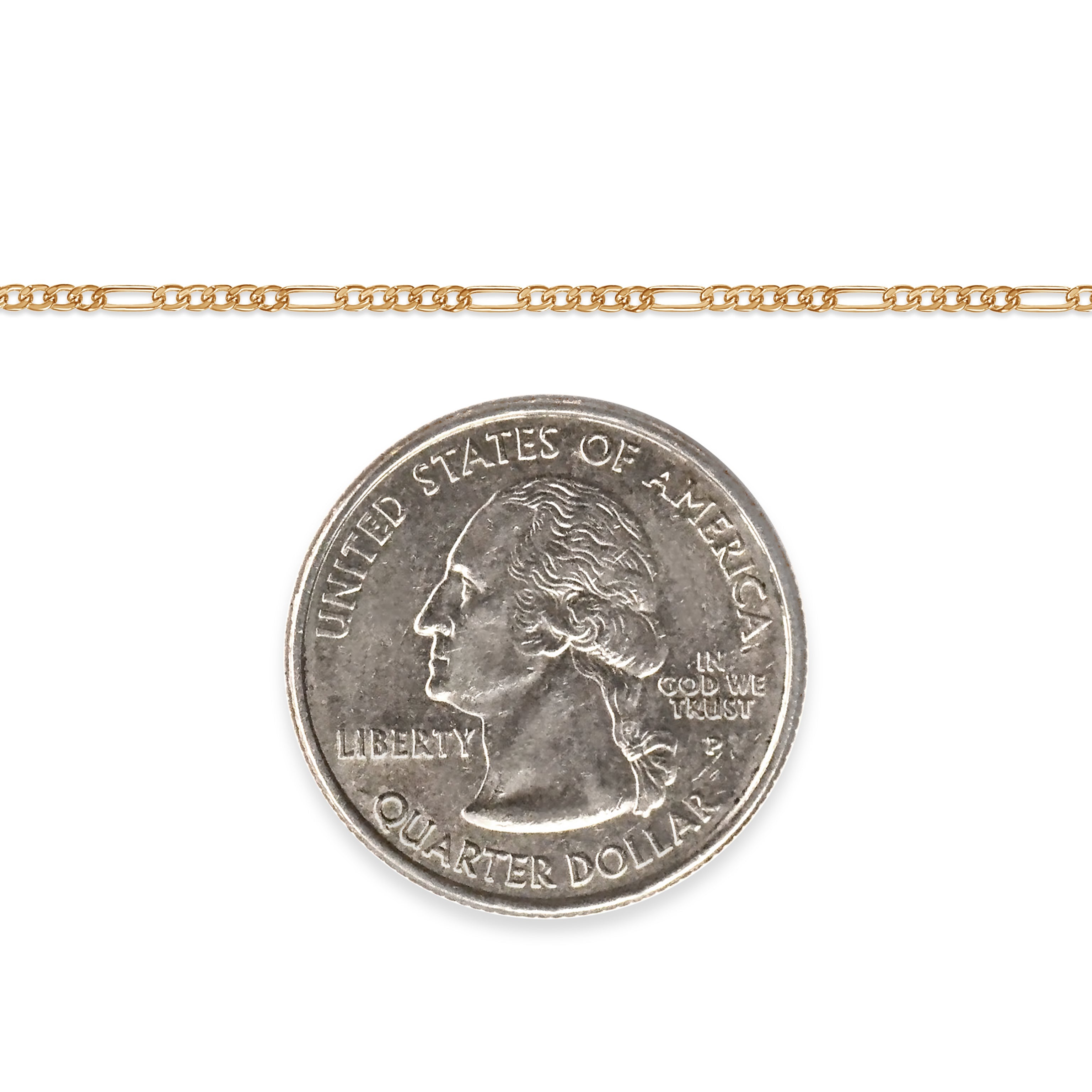 Gold-filled figaro chain next to a quarter dollar coin on a white background