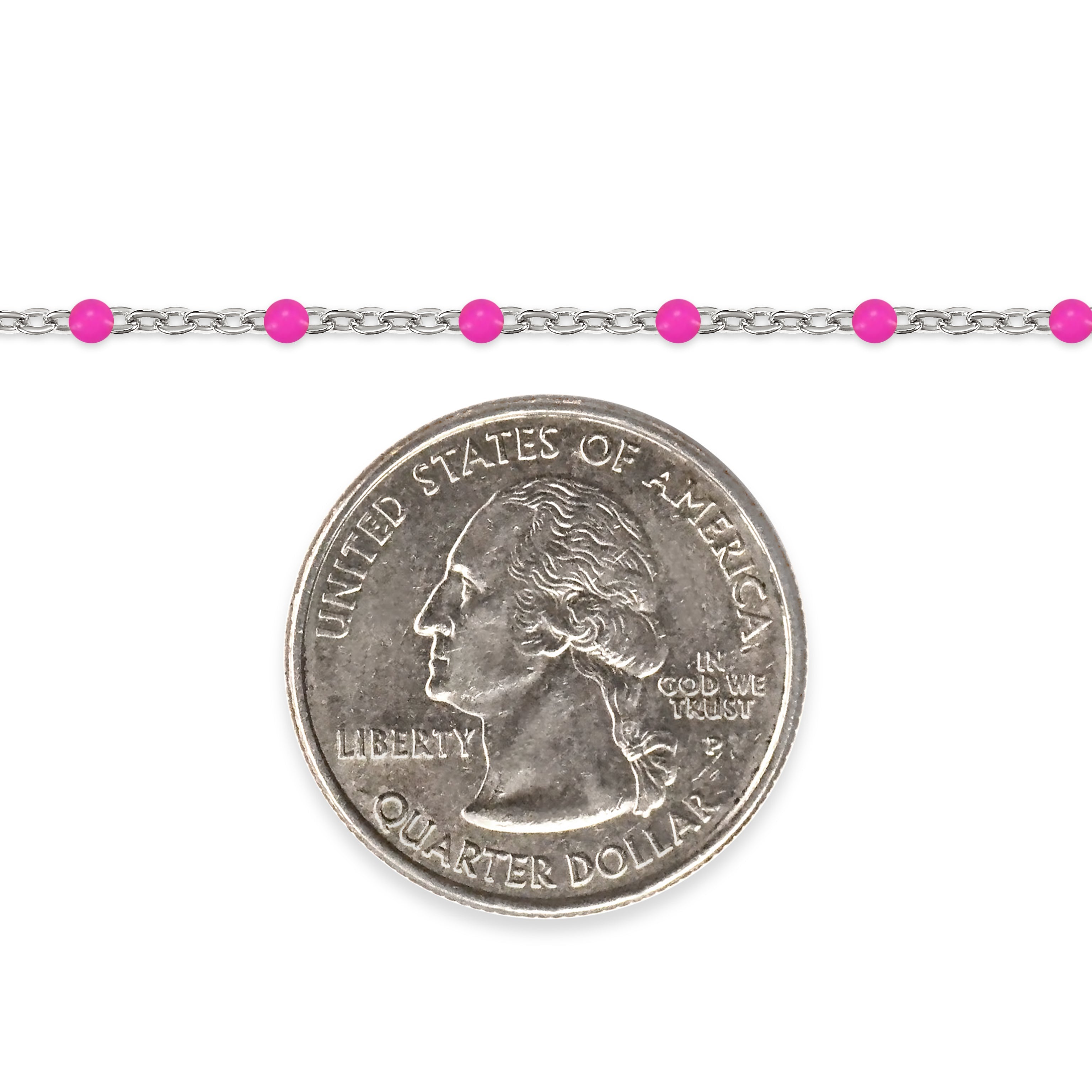 Silver chain with pink enamel beads and a quarter on a white background