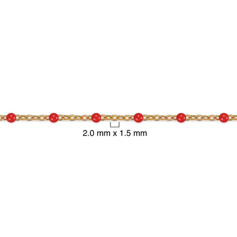 Gold chain with red beads on a white background