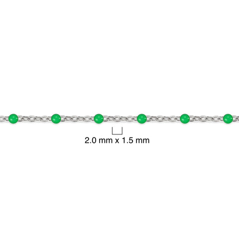 Silver chain with green enamel beads on a white background