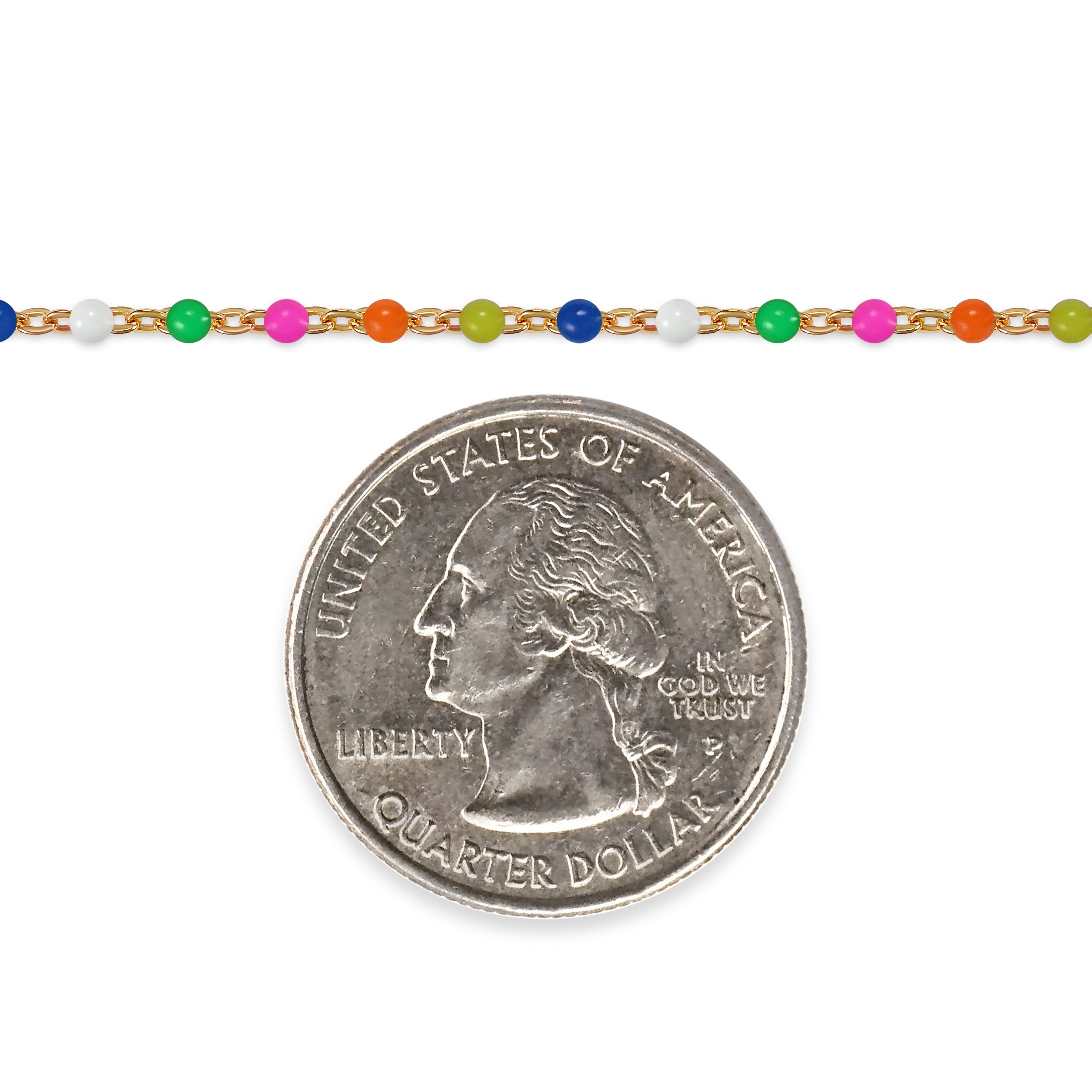 Colorful beaded bracelet on a quarter for size comparison