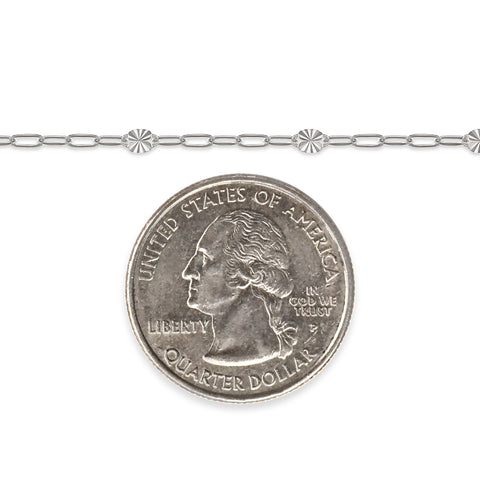 Silver chain with a quarter dollar coin on a white background