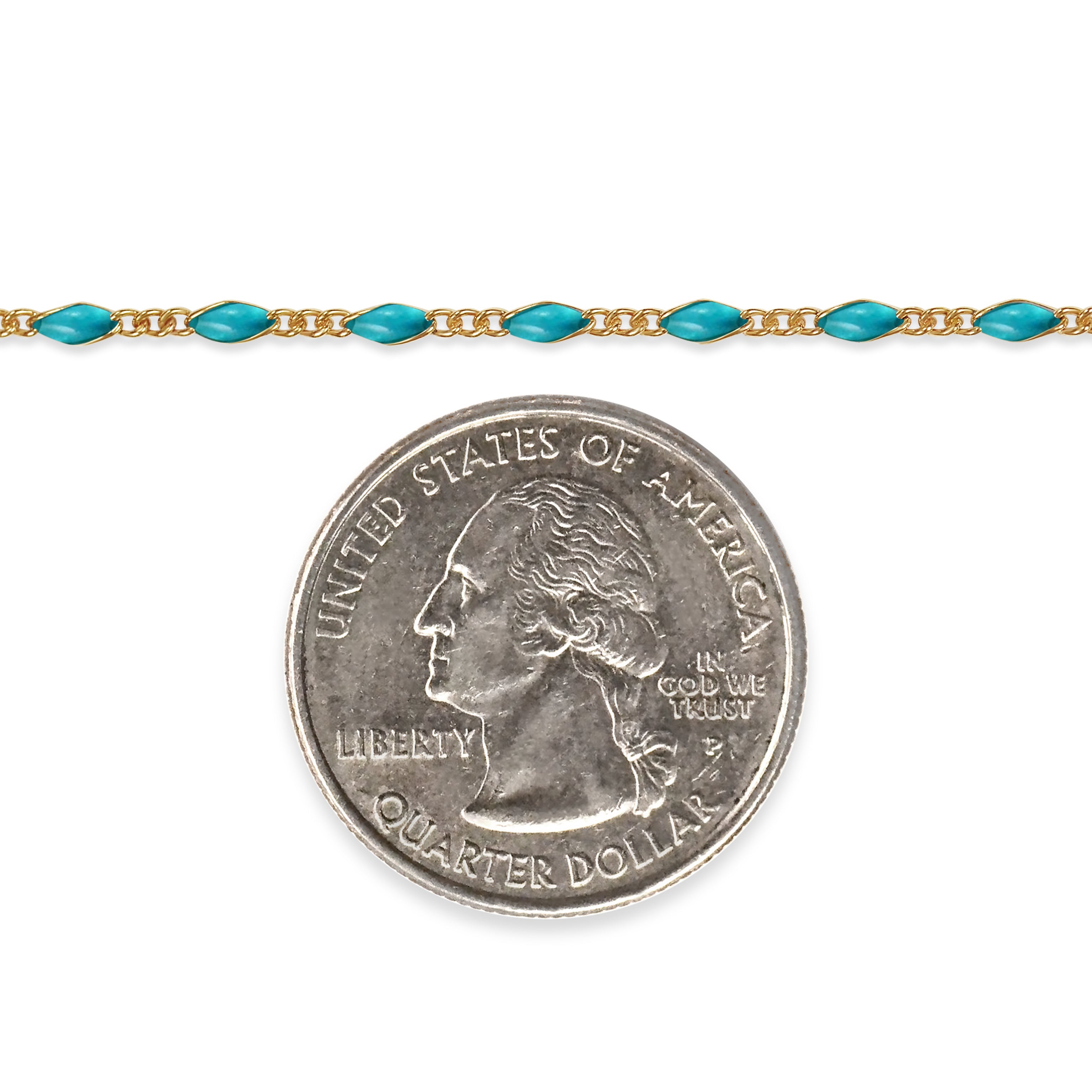 Gold filled chain with turquoise enamel and a quarter dollar coin on a white background
