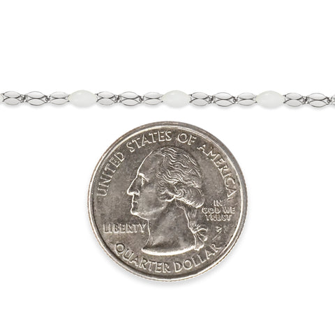 Silver chain with white enamel and a quarter dollar coin on a white background