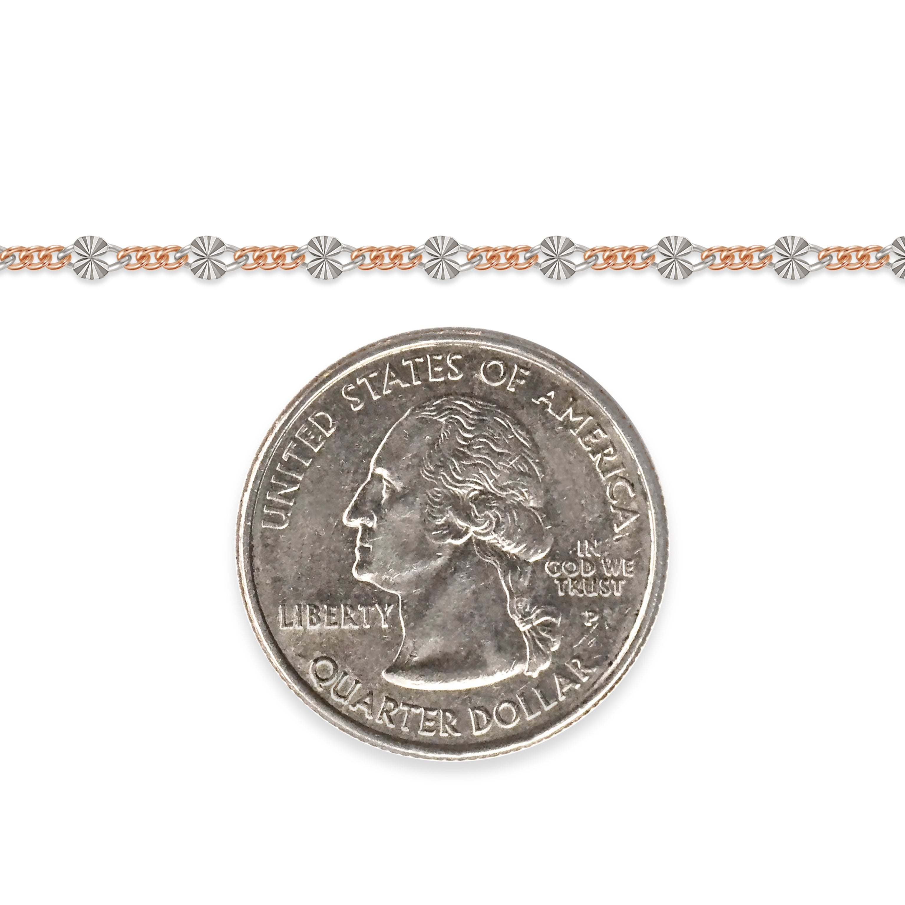 Rose gold-filled and sterling silver chain next to a quarter on a white background