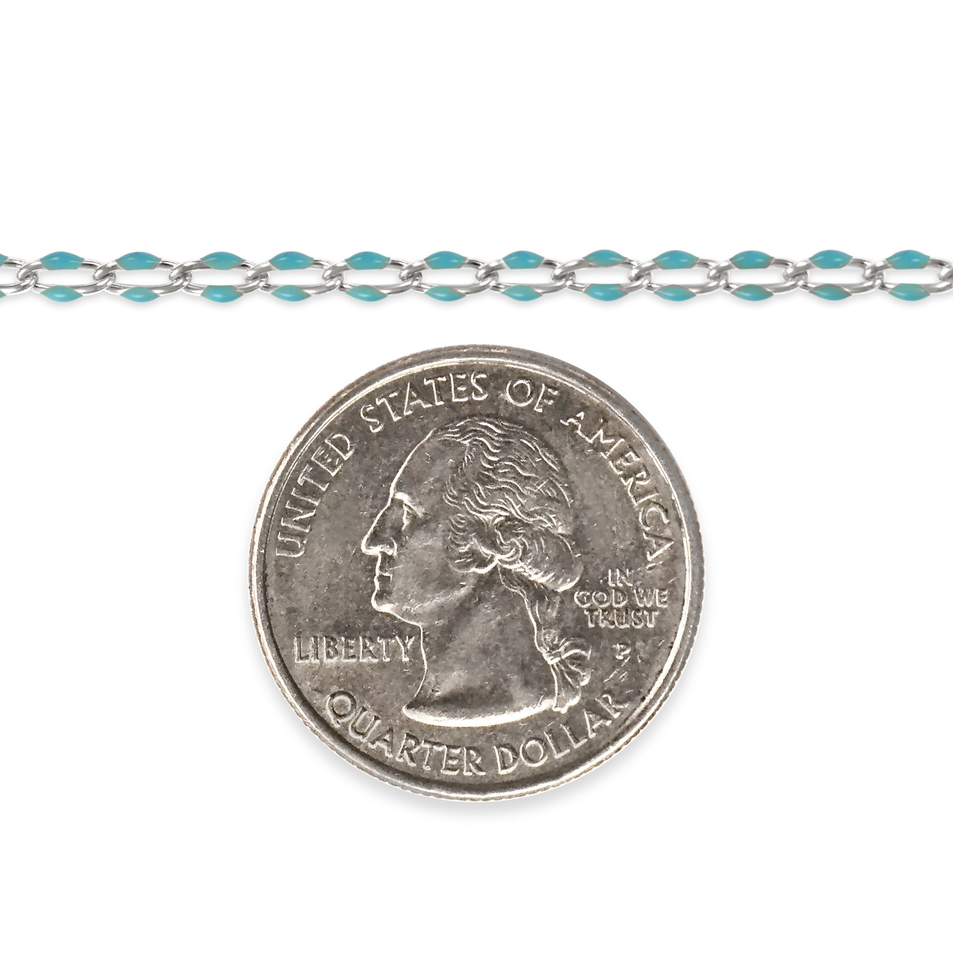 Silver chain with blue enamel next to a quarter on a white background