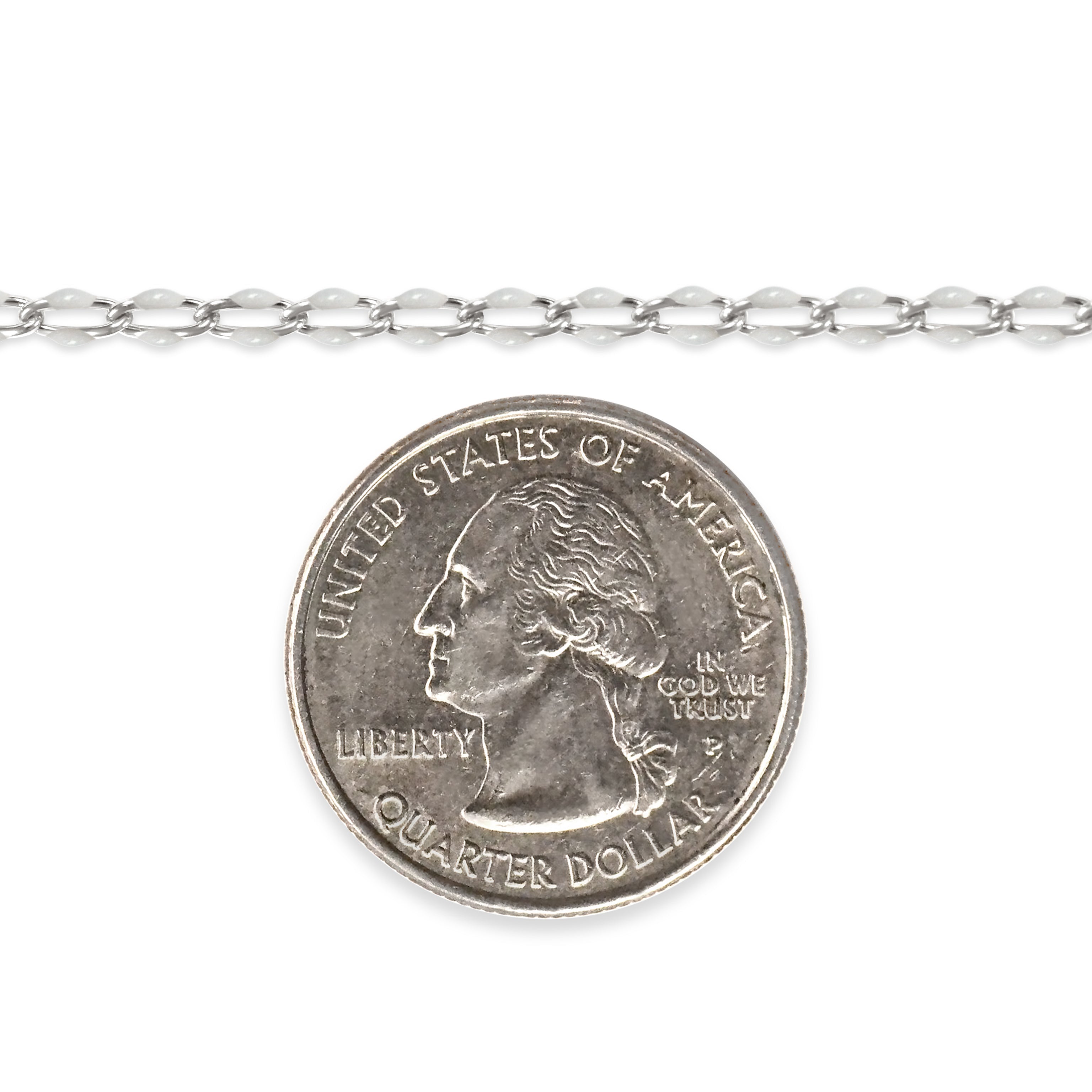 Silver chain with white enamel next to a quarter on a white background