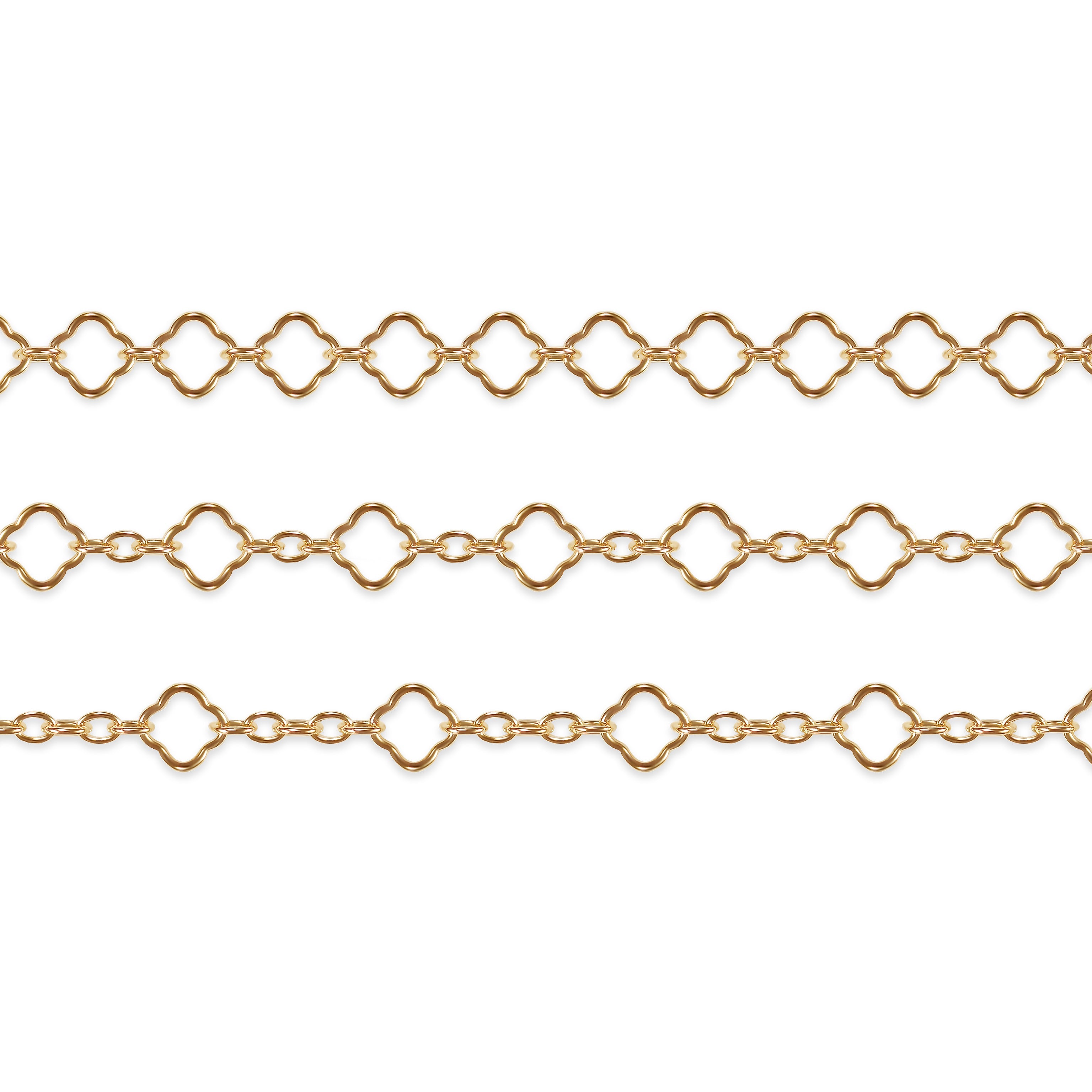 Gold filled clover chains on a white background