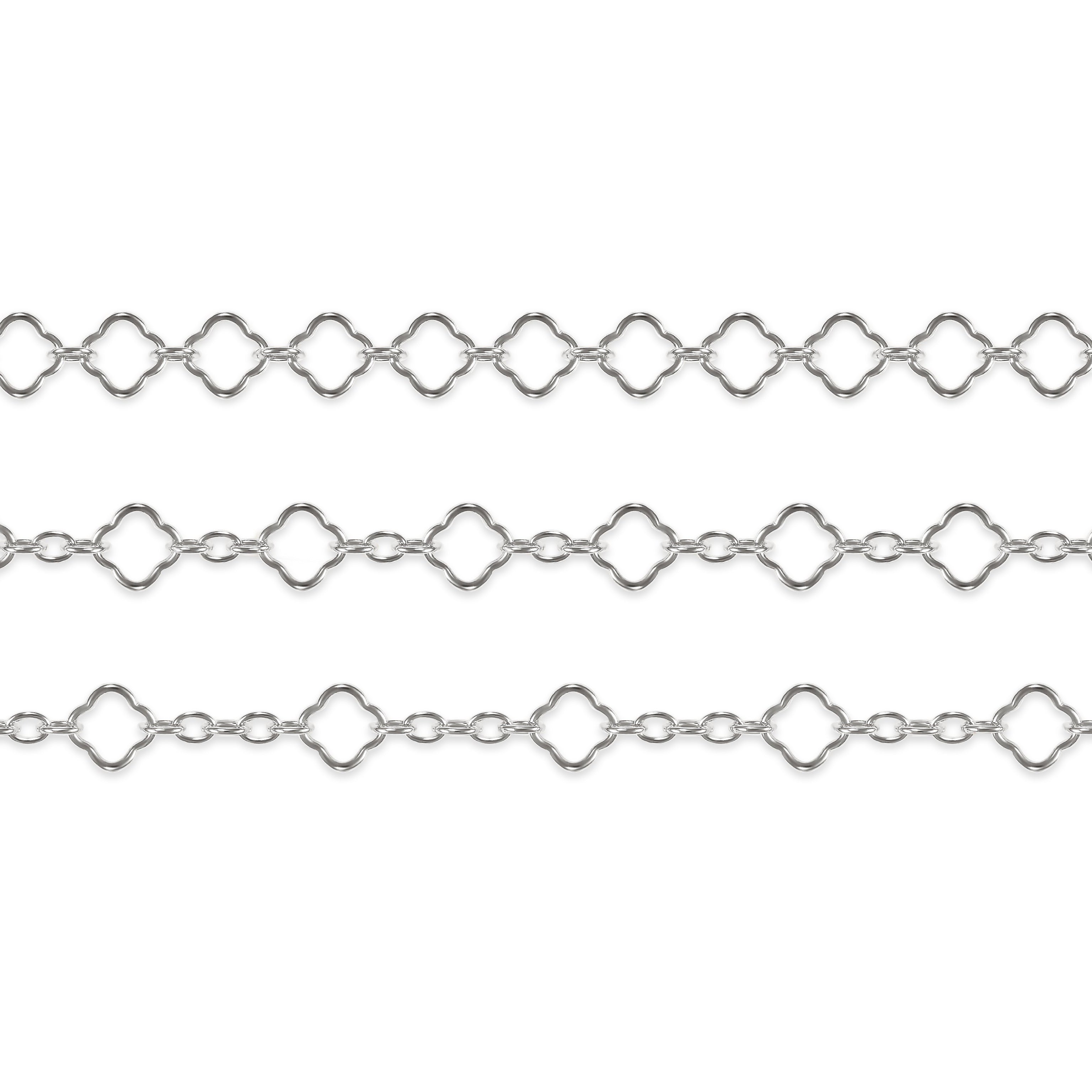 Sterling silver clover chains on a white background
